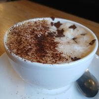 Best coffee ever with delicious dark chocolate sprinkles!! at Zappa's in Totnes