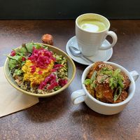 Small salad bowl, matcha latte 💚 and crispy GF cauliflower bites 🧡   at Zappa's in Totnes