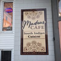 The restaurant sign at Madras Cafe in Appleton