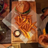 Spicy Beyond Meat burger with sweet potato fries   at Pub BEER GARDEN in Supetar