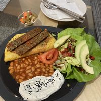 Breakfast with chickpea omelette   at Mishto Café & Deli in Budapest