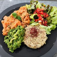 Full meal option, quinoa, broccoli and sweet potatoes with salad. at Mishto Café & Deli in Budapest