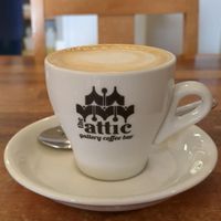 Oat milk flat white. at Harlequin Coffee and Tea House in York