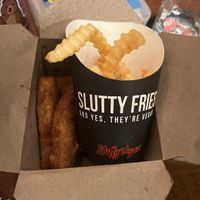 Tenders and fries, they don’t skimp on fries so don’t order extra   at Slutty Vegan in Brooklyn