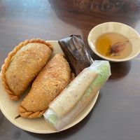 Appetisers: 2 vegan samosas, shredded tofu roll and rice dumpling cake - 35k at Mỹ Thoa Chay in Da Lat