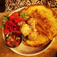 Roast cauliflower flatbread with red Cabbage kimchi, walnut and pistachio at PAL Bar and Kitchen in Grimsby