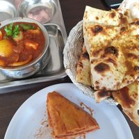 Soy chaap masala, garlic naan, bread pakora at Om Vegetarian Tarneit in Tarneit