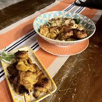 Sate skewers and peanut noodles  at Cosmic Siargao in Siargao