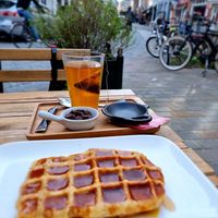 Waffle with caramel and tea at Chocolate Bar Brugge in Bruges