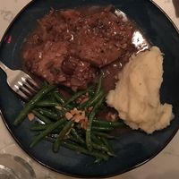 special- seared seitan, red wine gravy, green beans with almonds, potato mash at Urban Vegan Kitchen in New York City