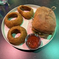 Tofuego with side of onion rings  at Urban Vegan Kitchen in New York City