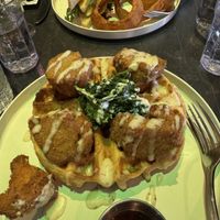 Chicken and waffles and the tofu breakfast Sammie  at Urban Vegan Kitchen in New York City