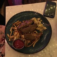 Jerks chicken with fries. at Urban Vegan Kitchen in New York City