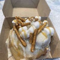 BYO roll with crème brûlée icing, caramel, pretzels, and marshmallows   at Cinnaholic in Carmel