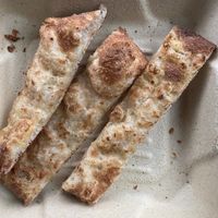 what was left of the vegan cheesy bread with marinara dipping sauce! #Veganuary at Leonardo's Pizza in Portland