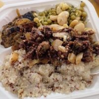 Vegan 'salmon' & vegan 'lamb' with green peas and lima beans stew and quinoa at Celebrity Pure Vegan in Georgetown
