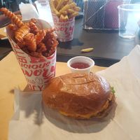 The burger looks small because I already ate some! at UNiQ Burger in Scottsdale