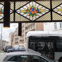 beautiful interior with stained glass windows at Verdō in Brussels