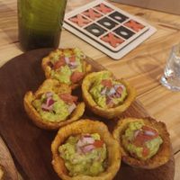 Canastitas de tostones con guacamole: plantain, avocado, tomatoes, red onions at Vegano O No in Panama City