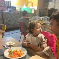 Mia figlia che apprezza la Pinza Napoli: pomodorini capperi e olive. Oltre che il supplì e la crocchetta.  at Veghometro in Rome