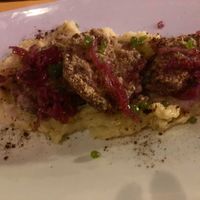 Soy steaks marinated with coconut milk, rosemary and gluten free soy sauce, potatoes cream, basil caviar and sweet and sour onions  at Veghometro in Rome