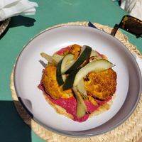 Roasted cauliflower on beetroot hummus with pickles  at Pikala Cafe in Marrakech