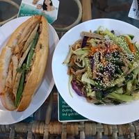 Bahn mi and noodles at Genkan Vegan Cafe in Dong Hoi