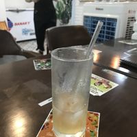 the straw is glass, not plastic  - a big plus for the environment   at Genkan Vegan Cafe in Dong Hoi