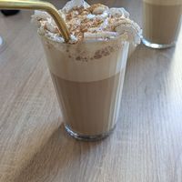 Pumpkin spice latte (vegan cream) at Fika Ladencafé in Munich