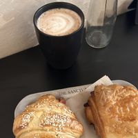 croissant w/ ham and cheese (delicious) and pain au chocolat, hot chocolate   at The Sanctuary in Berlin