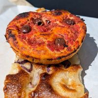 Focaccia and baresina con olive at The Sanctuary in Berlin