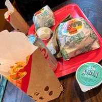 Love burger, waffle fries and vegan alioli  at LEON in Dartford