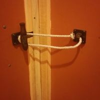 bathroom lock, love it! at Sticks and Stones Clay Oven Pizza in Greensboro