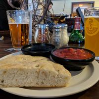 Homemade foccacia appetizer at Sticks and Stones Clay Oven Pizza in Greensboro