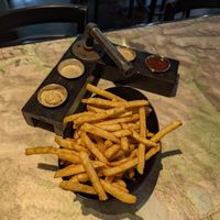 These thick cut fries were great! I doubt these sauces are all vegan, but the fries themselves were great and my wife enjoyed the sauces. at Trail Life Brewing in Grand Junction
