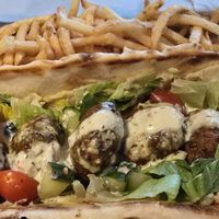 Vegan Falafel Wrap with fries at Trail Life Brewing in Grand Junction