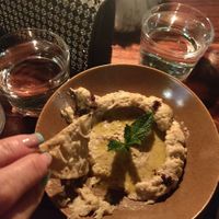 I couldn't wait to try the babaganoush, and that's why the photo shows the dish already started to eat, it was delicious!  at Malaak al Horno in San Cristobal De Las Casas