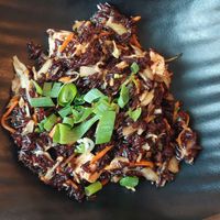 Black rice with tofu, pad thai sauce at Buddha Original in Budapest