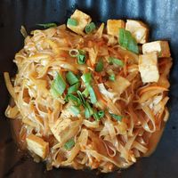 Rice noodles, tofu, yellow curry sauce at Buddha Original in Budapest