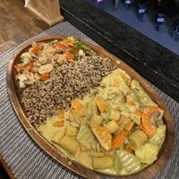 “Double Trouble” 320 Pesos. Half vegetable curry, half tofu sisig (substituted for mushrooms as they had ran out) and quinoa.   at Hungry Monkeys in Cebu