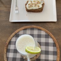 An amazing vegan carrot cake with a smoothie. Would absolutely recommend this place   at Tyche in Antalya