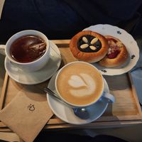 Poppyseed, and strawberry kolac with a cup of tea and a chai latte at Kolacherie Celetna in Prague