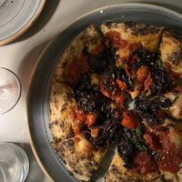 Pizza marinara con pomodoro arrostito a cui abbiamo fatto aggiungere del radicchio   at Crosta in Milan
