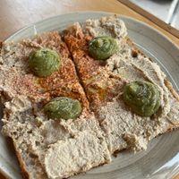 Pizza alla pala hummus, guacamole and paprika  at Crosta in Milan