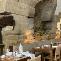 the inside of the restaurant   at Le Moulin in Lourmarin