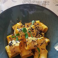 Mezzi paccheri con zucca, curry e crumble olive at Dispensa Franciacorta in Adro