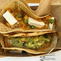 Taco de guisado (top, 5.49 lev) and taco de frijoles (4.99 lev). Note a 10% discount for buying 2 tacos, or 15% for buying 3. So these cost 9.43 lev total.  at Mangia Station in Sofia
