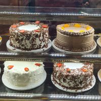 Cake Display Case- top two cakes are vegan at Fully Baked in Nairobi