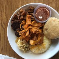 Brunch Bowl!!!!! Scrambled Tofu,Cheesy Grits,Fries,Carrot Bacon,sausage, at Bean Vegan Cuisine in Charlotte