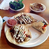 Tacos with steamed kale and mashed potato & gravy sides at Bean Vegan Cuisine in Charlotte
